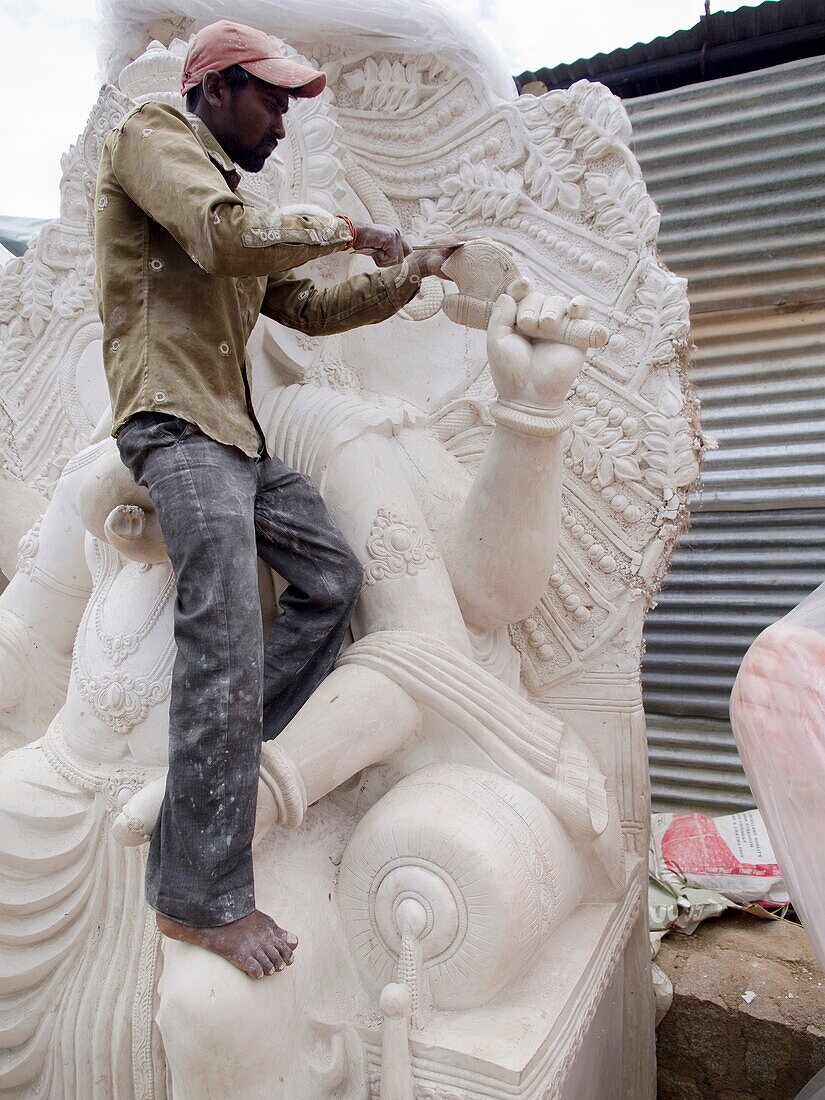 Making Ganesha statues for the Ganesha Chaturthi festivities in Bangalore, India