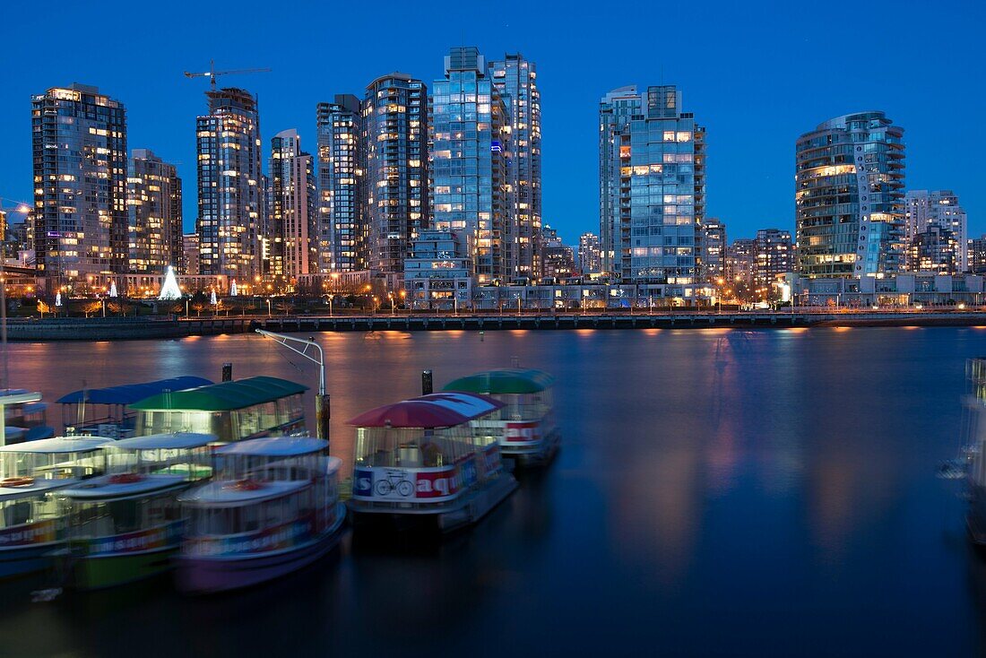 Vancouver skyline with boats at Granville Island