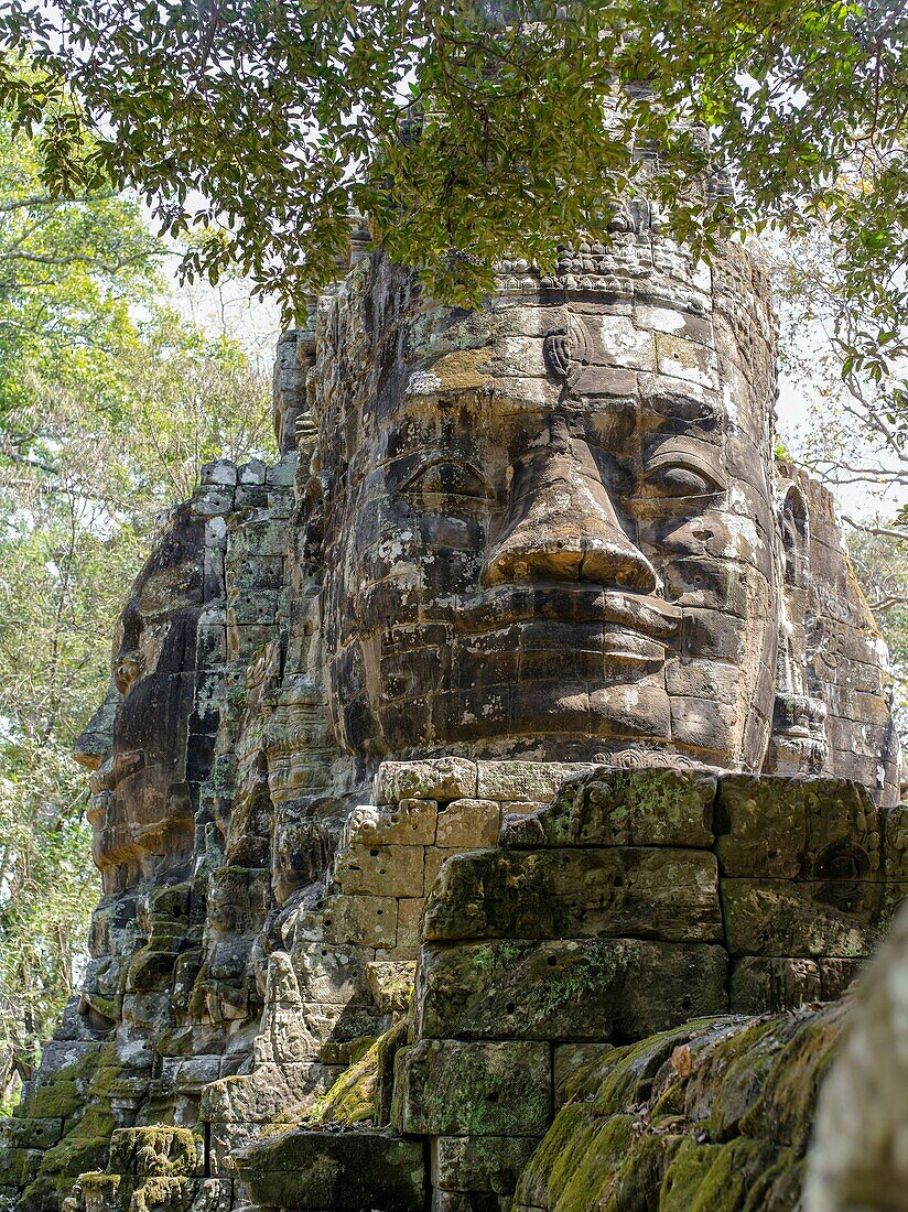 Angkor Thom, located in present day Cambodia, was the last and most enduring capital city of the Khmer empire. It was established in the late twelfth century by king Jayavarman VII. It covers an area of 9 km², within which are located several monuments fr