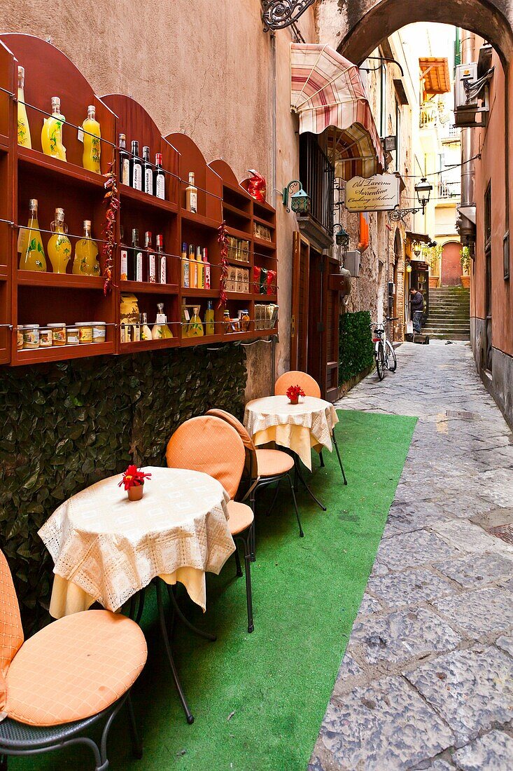Tables and chairs at an outdoor restaurant in Sorrento, Campania, Italy