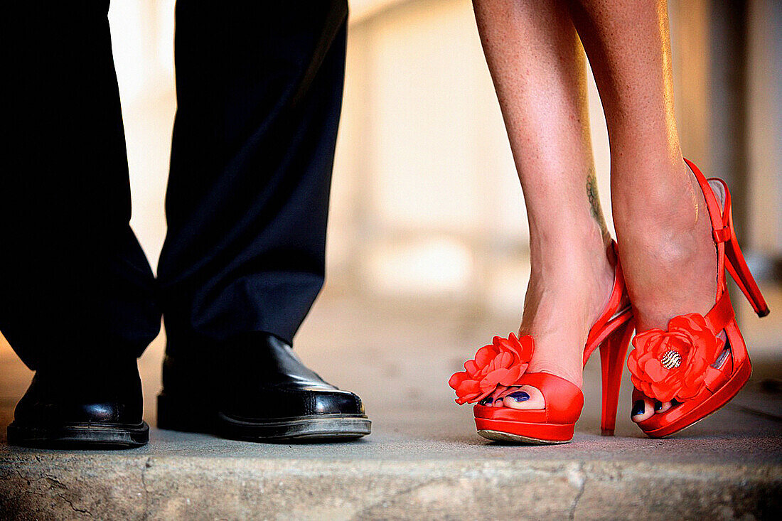 non-traditional bride & groom wearing orange wedding shoes @ their intimate winery wedding