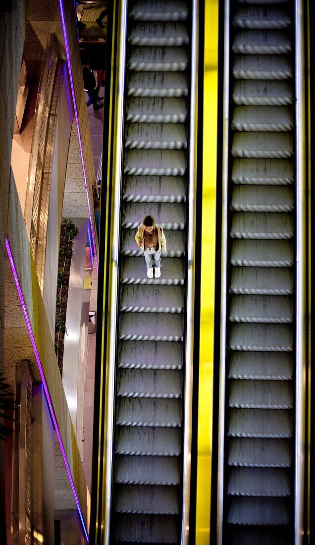 girl alone in mall