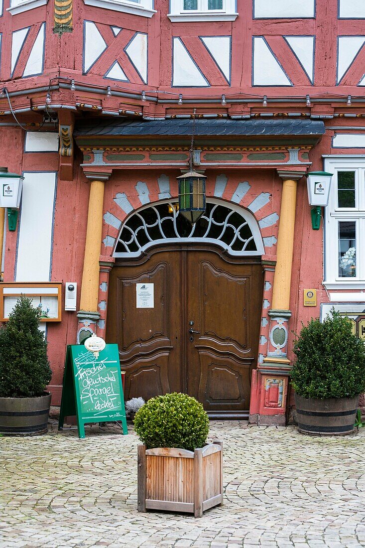 Close up of the entrance of a timbered house in Ziegenhain, Hesse, Germany, Europe