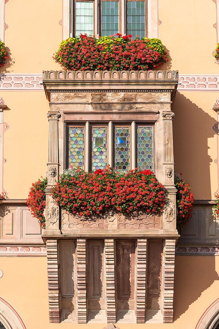 Decorated windows on a house in Obernai, Alsace, France, Europe