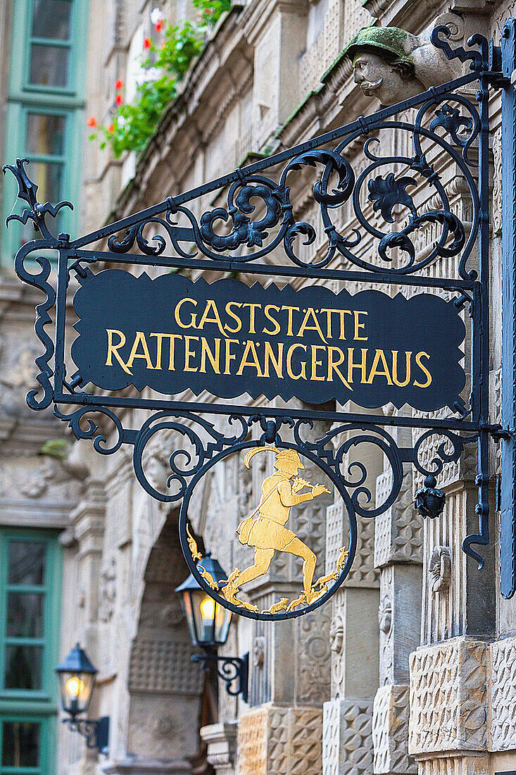 Beautiful adorned sign of the Rattenfaengerhaus in Hamelin on the German Fairy Tale Route, Lower Saxony, Germany, Europe