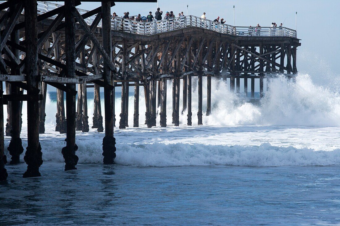 Wooden pier juts out into the Pacific Ocean