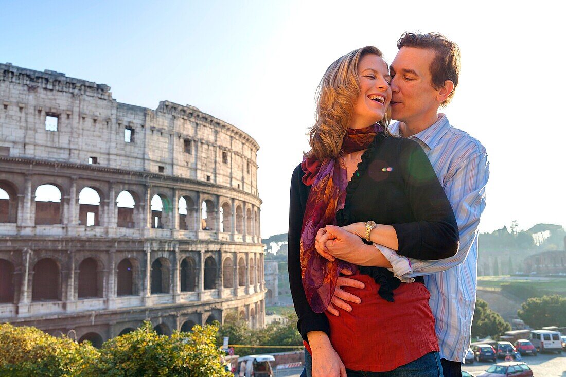 Couple at the roman Colosseum Rome Italy