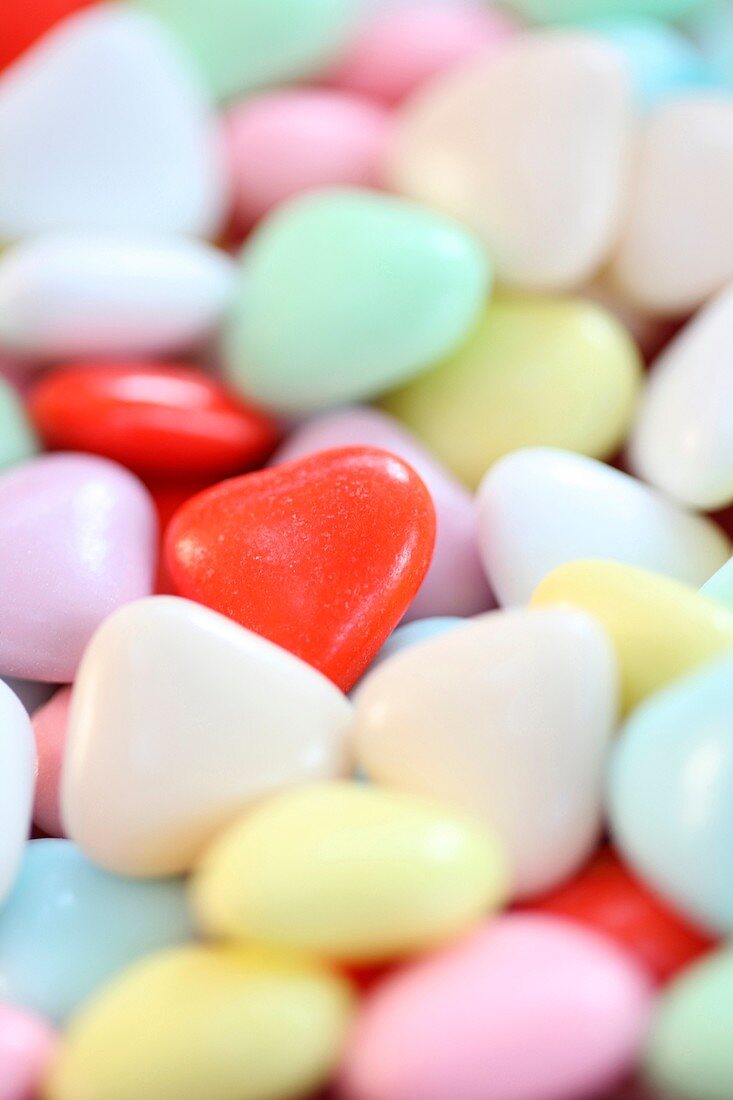 a bowl of heart shaped sweets, heart candy