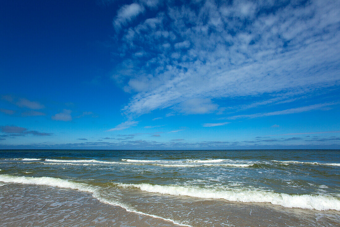 Clouds and waves on the beach near Kampen, Sylt island, North Sea, North Friesland, Schleswig-Holstein, Germany