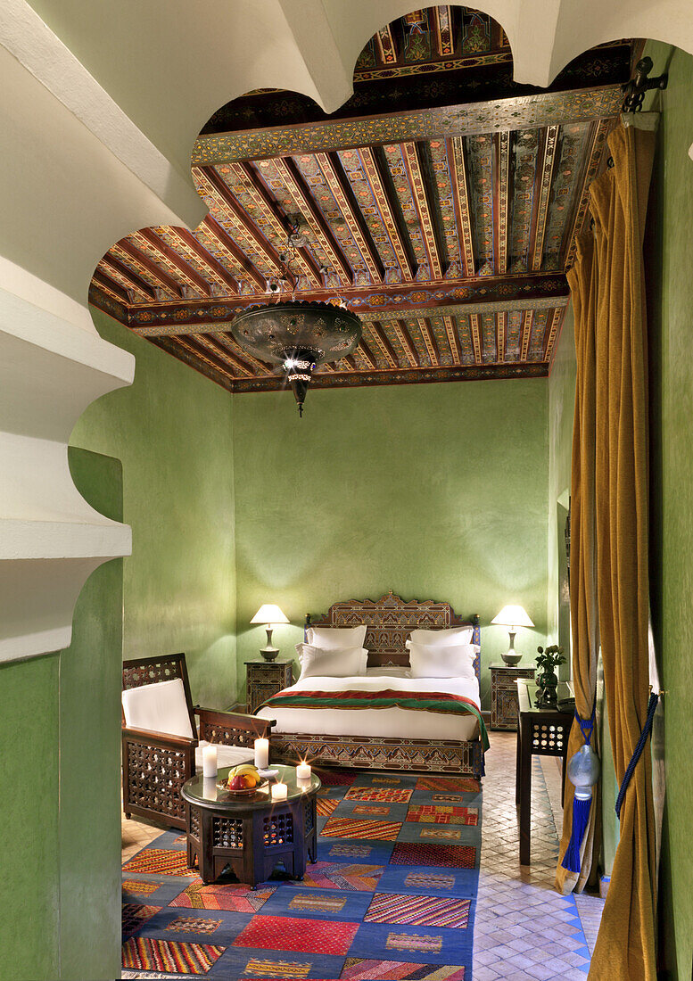 Arched doorway leading into guest room, Dar Les Cigognes, Marrakech, Morocco