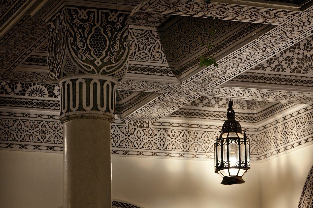 Moroccan Lamp casting light and shadows, Villa des Orangers, Marrakech, Morocco