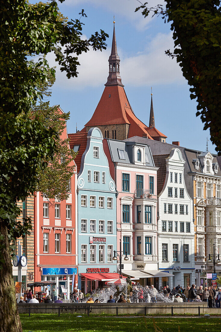 Houses with St. Mary's church, Marienkirche, in the background, Kroepeliner Strasse, Hanseatic town of Rostock, Mecklenburg Western Pommerania, Germany