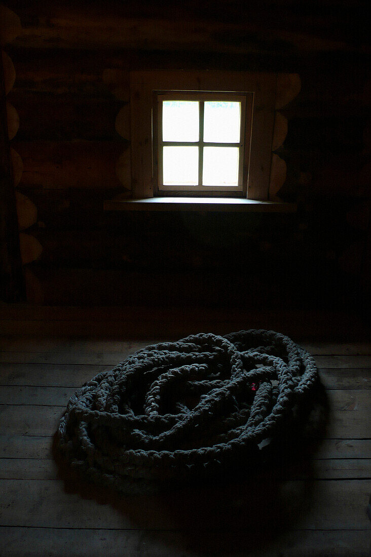 Pile of Braided Rope on Farmhouse Floor