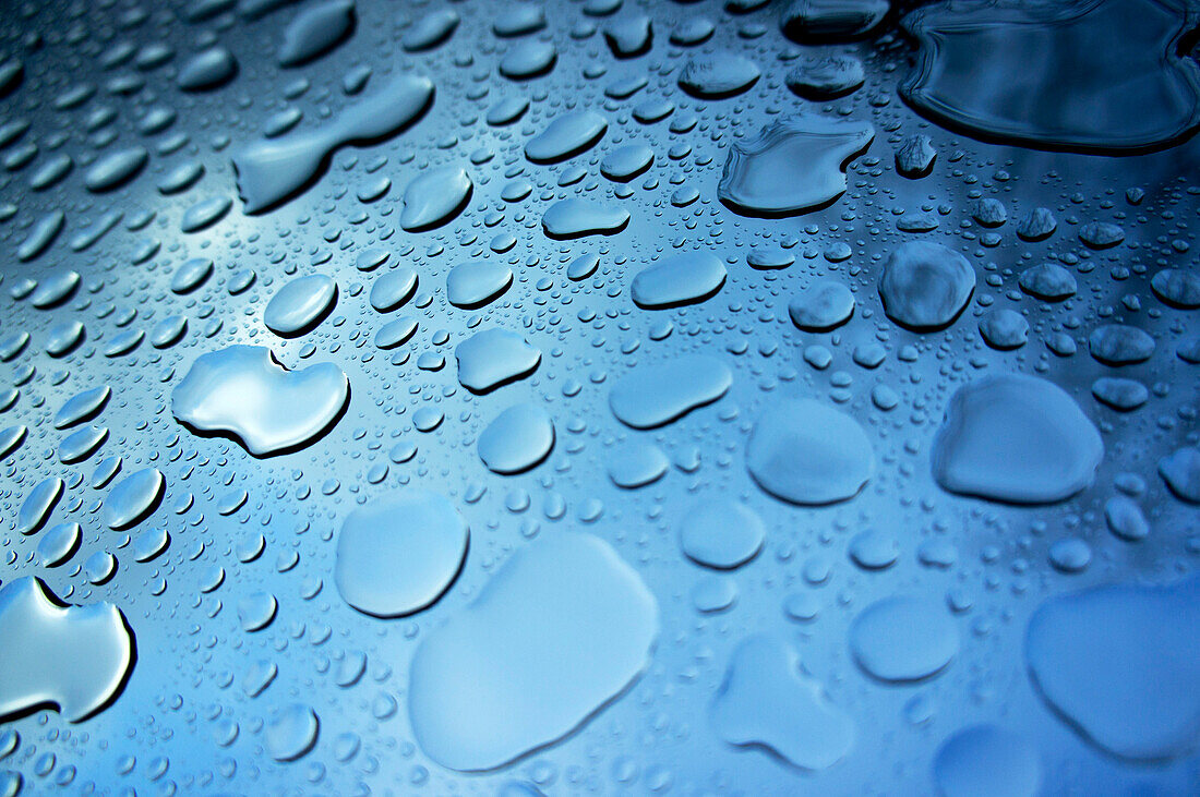 Raindrops on Blue Surface
