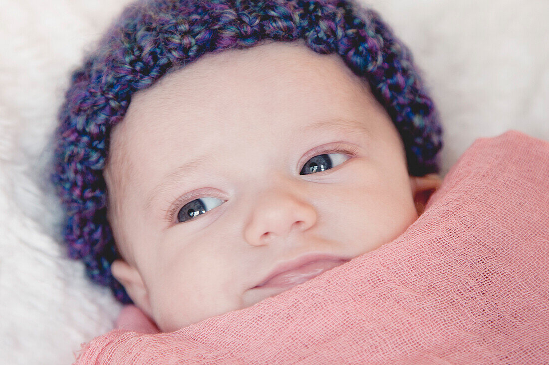 Newborn Baby in Purple Hat, Close Up, Portrait