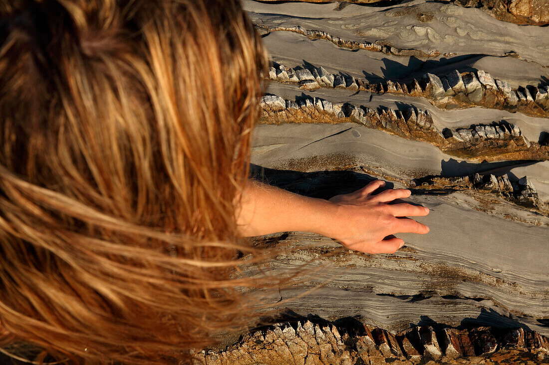 Girl Touching Stone, High Angle View