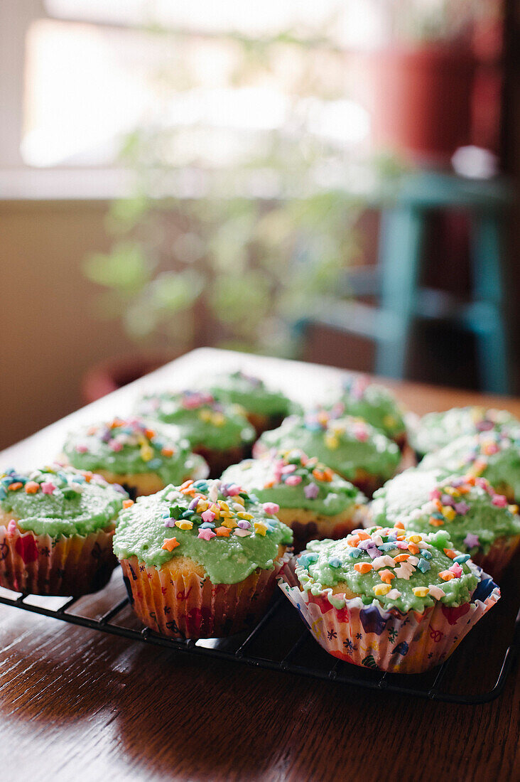 Cupcakes With Green Icing and Star Sprinkles