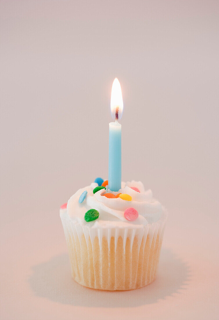Vanilla Cupcake with Lit Candle