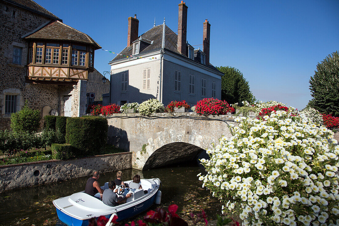 A Ride In An Electric Boat On The Part Of The Loir River Surrounding The Town, Medieval City Of Bonneval, Nicknamed The Little Venice Of The Beauce, Eure-Et-Loir (28), France