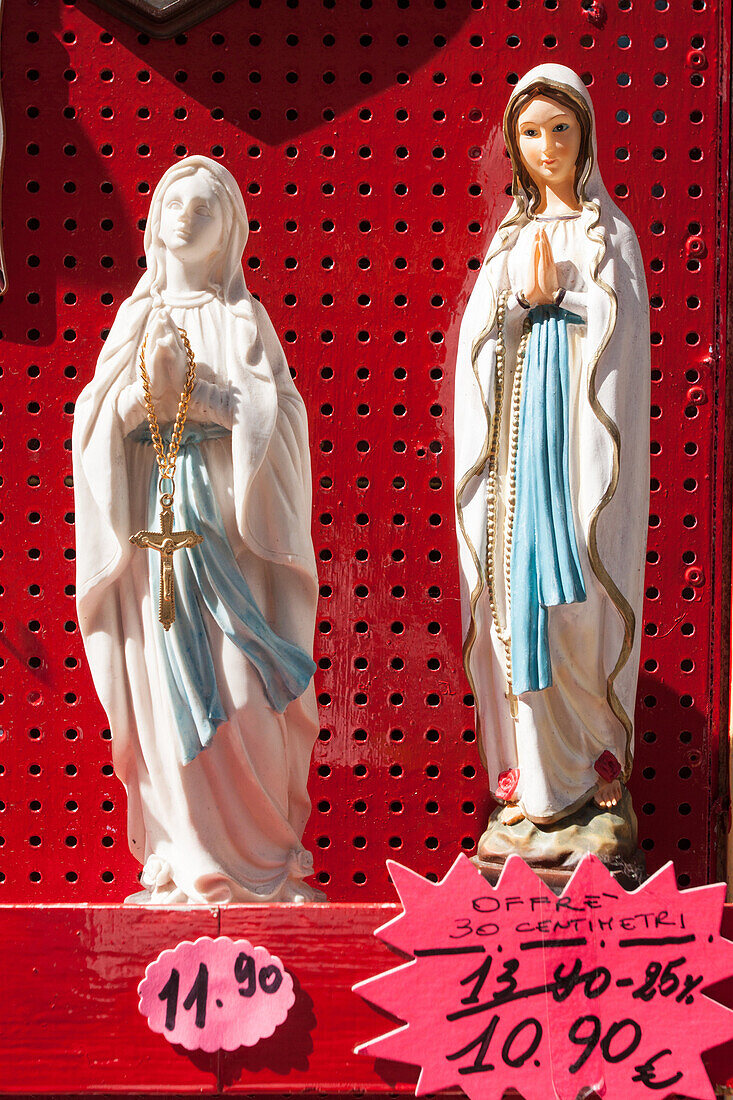 Statuettes Of The Virgin On A Religious Souvenir Seller'S Stall, Town Centre Of Lourdes, Hautes-Pyrenees (65), Midi-Pyrenees, France