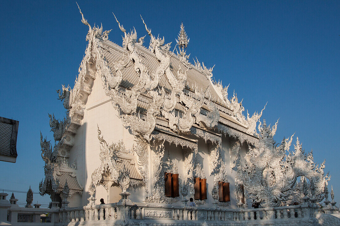 General View Of The White Temple Or Wat Rong Khun, Temple Built By The Thai Painter Chalermchai Kositpipat Who Wanted To Create A Lasting Tribute To Rama 1X, Region Of Chiang Rai, Thailand, Asia