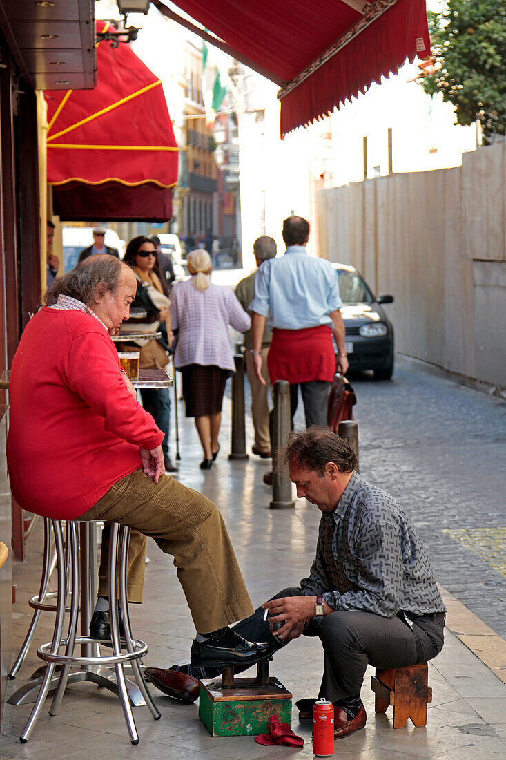 Shoeshiner, Street Scene, Seville, Andalusia, Spain