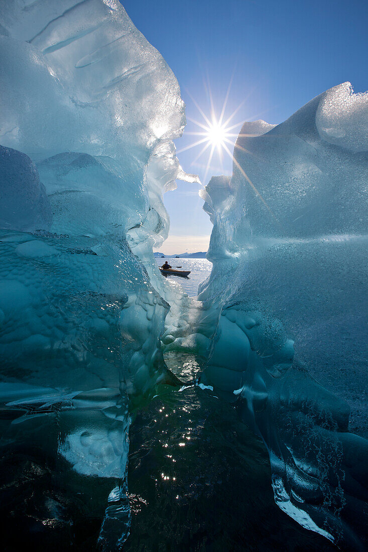 Sea Kayaker Views Large Icebergs In Stephens Passage On A Warm Summer Afternoon, Tracy Arm-Fords Terror Wilderness, Inside Passage, Southeast Alaska