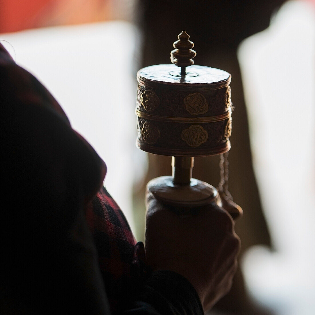 'China, Xizang, Hand Holding Incense Burner At Drepung Monastery; Tibet'