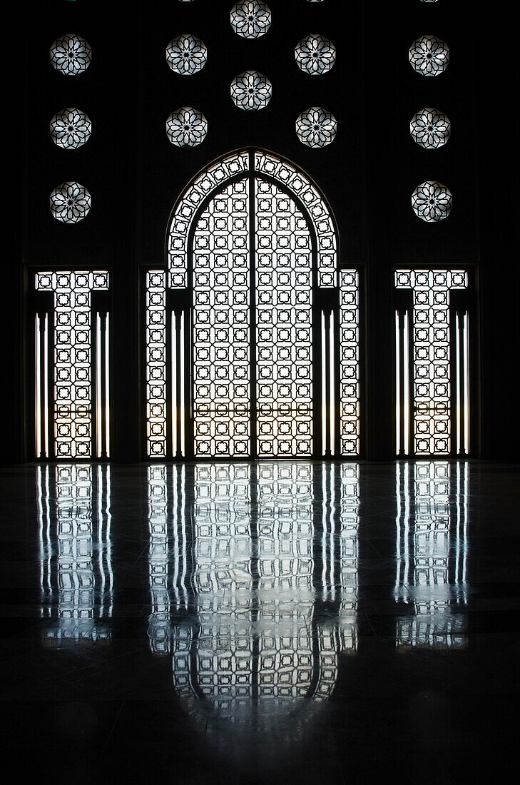'Morocco, Ornate Wall In Hassan Ii Mosque With Reflection On Shiny Floor; Casablanca'
