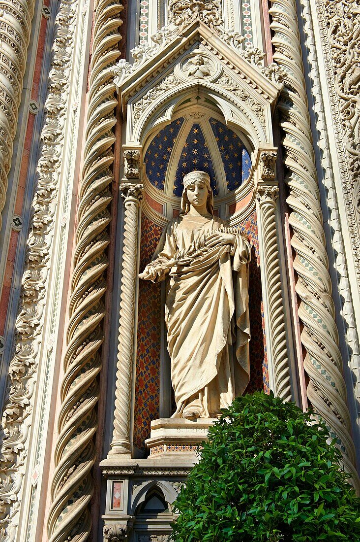 Statue of of Saint Reparata on the facade of the Gothic-Renaissance Duomo of Florence, Basilica of Saint Mary of the Flower, Firenza  Basilica di Santa Maria del Fiore   Built between 1293 & 1436  Italy