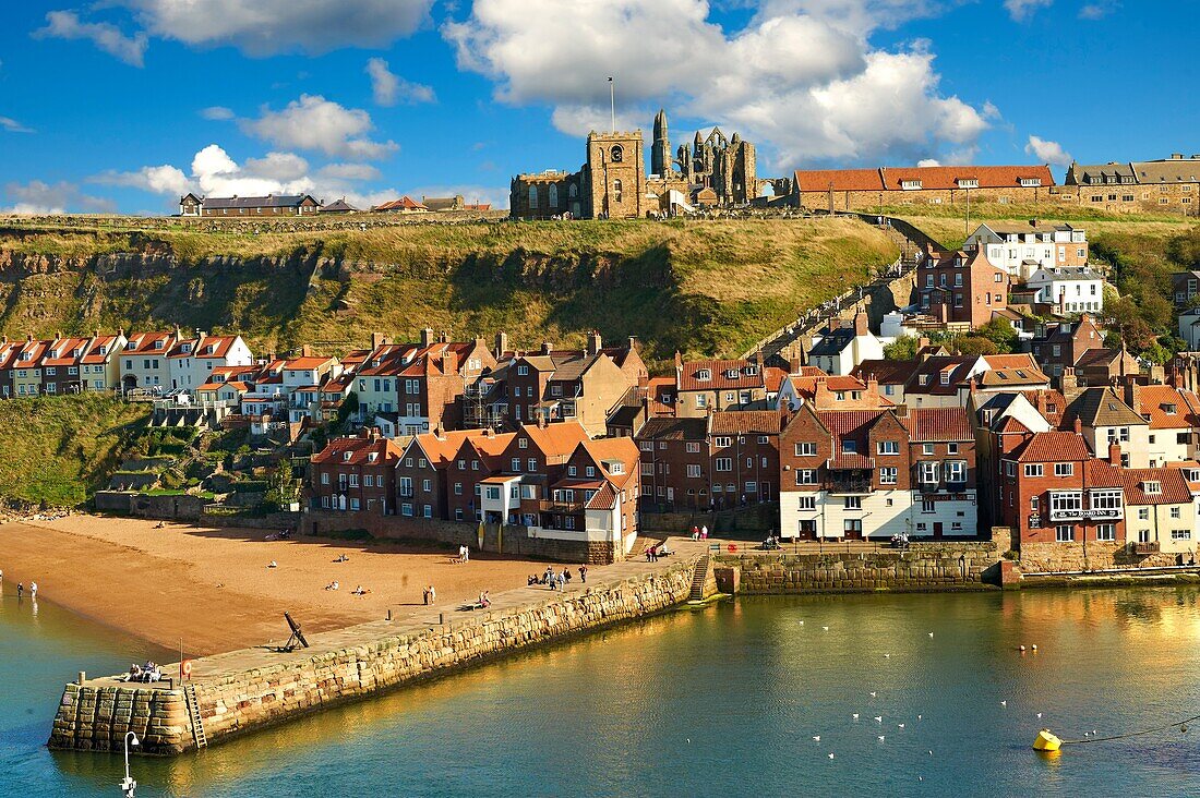 Whitby harbour with Whitby Abbey on the headland  Whitby, North Yorkshire, England