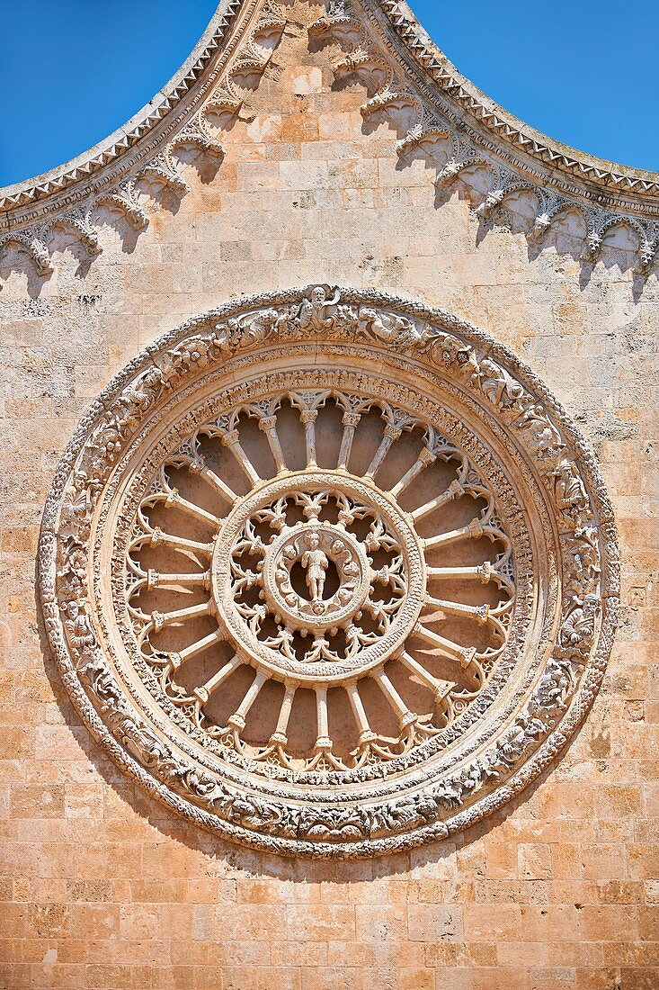 Rose Window on the The Italian Gothic medieval Cathedral of Ostuni built between 1569-1495 Ostuni, The White Town, Puglia, Italy