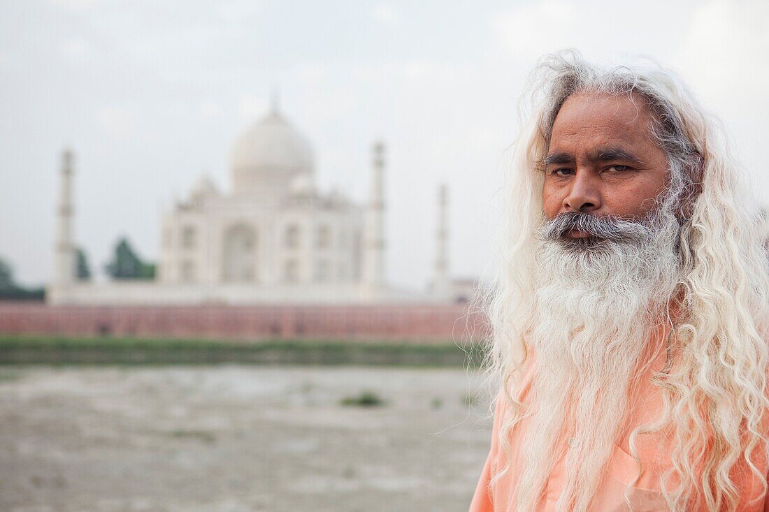 Indian Holy Man In Front Of Taj Mahal, Agra, Uttar Pradesh, India