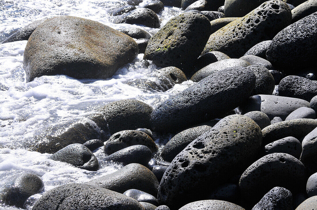 Stones on the beach, Baia das Canas near Prainha, Island of Pico, Azores, Portugal