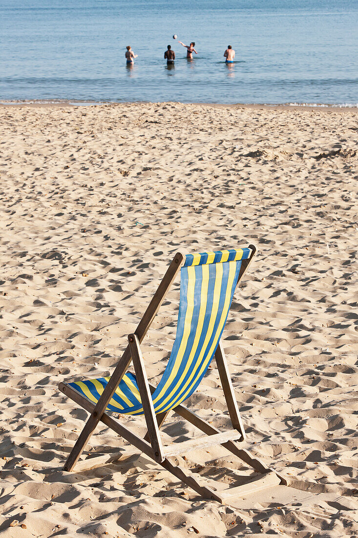Paul, Quayle, Outdoors, Day, Incidental People, Relaxation, Sunlight, Non Urban Scene, Idyllic, Tranquility, Sea, Sand, Beach, Vacations, Travel Destinations, Absence, Simplicity, Bournemouth Beach, Bournemouth, Dorset, England, Deck Chair, Striped, Open 