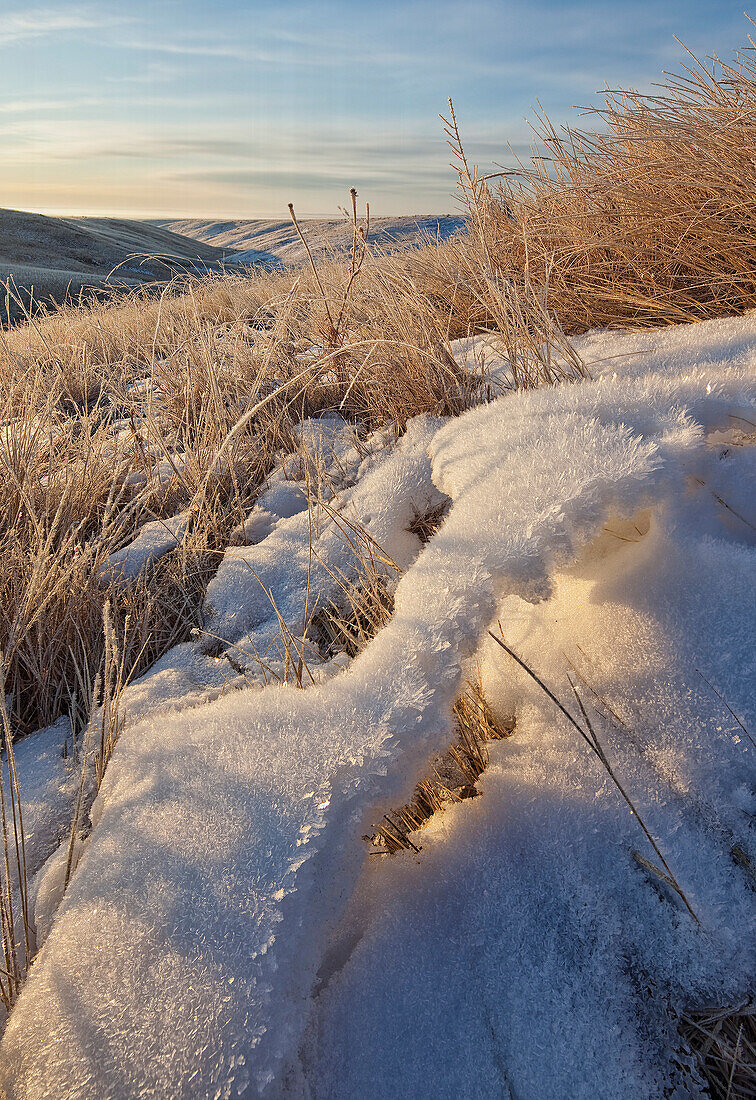 Snow Forms A Small Snow Bridge On The Prairies In Grasslands National Park, Saskatchewan Canada
