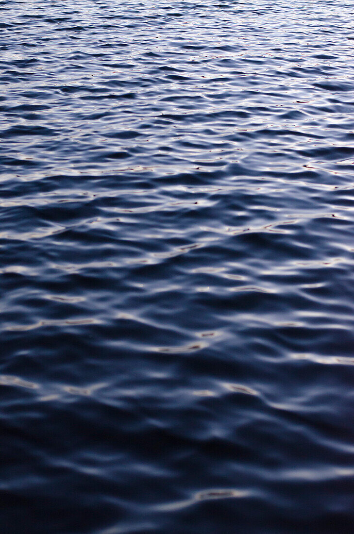 Light and Shadow Texture on Blue Lake Water