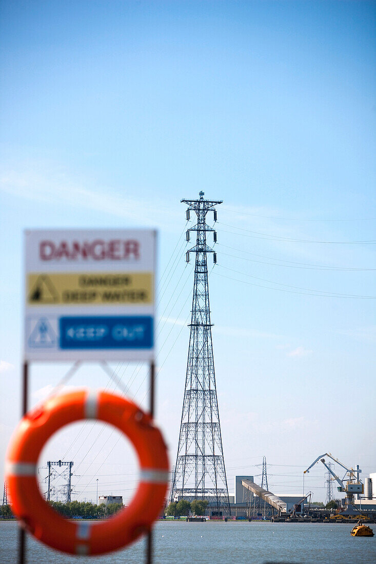 Lifebelt and electricity pylon in background, England, Great Britain