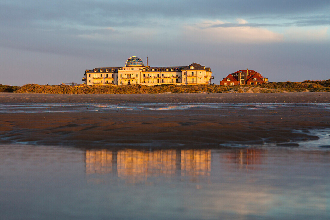 Spa Hotel at sunset, Juist Island, Nationalpark, North Sea, East Frisian Islands, East Frisia, Lower Saxony, Germany, Europe