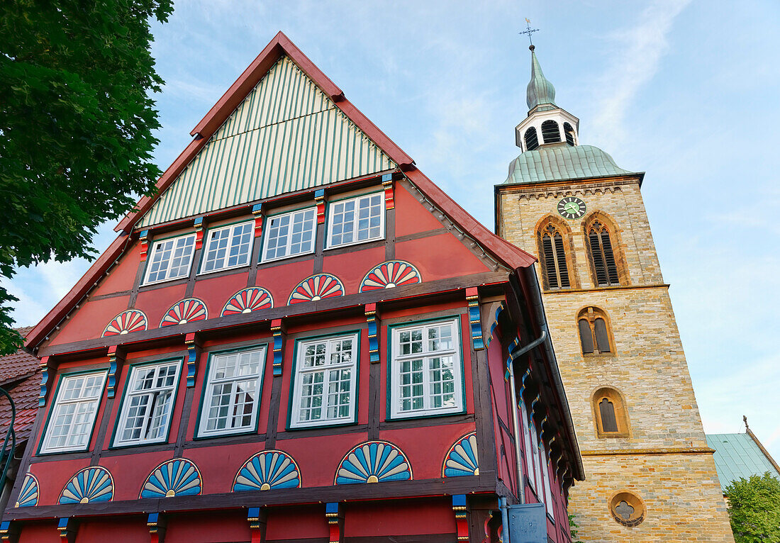 Half-timbered house and Saint Aegidius church, Rheda-Wiedenbrueck, North Rhine-Westphalia, Germany