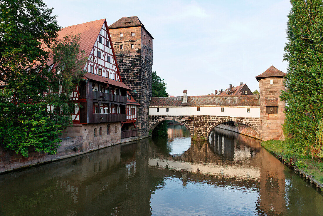 View of max bridge, the river Pegnitz, half-timbered building of the Weinstadel, water-tower and Henkersteg footbridge, Nuremberg, Middle Franconia, Bavaria, Germany