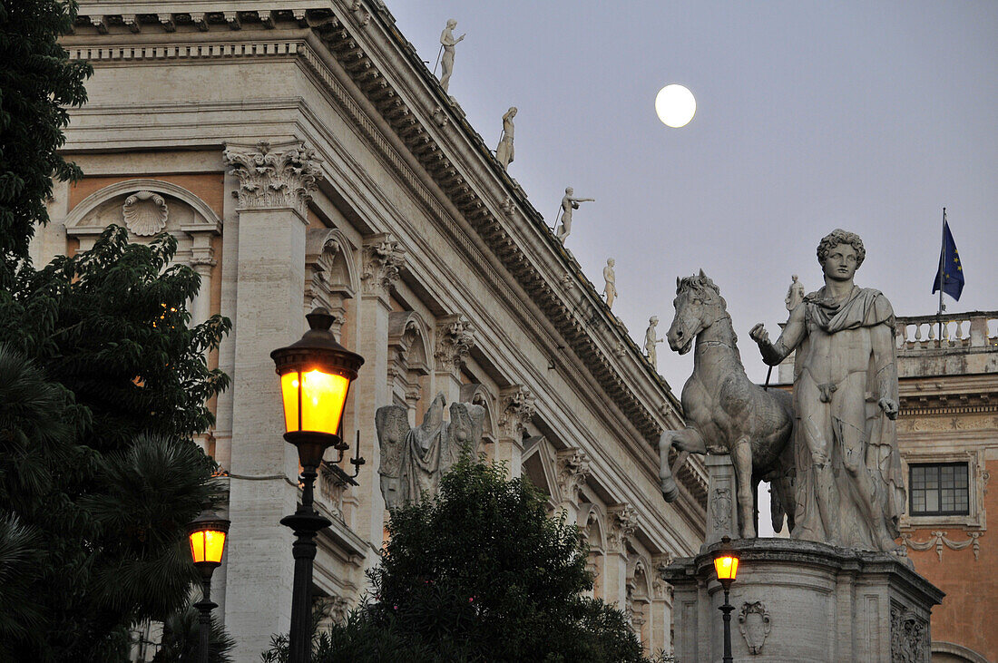 Full moon over Piazza del Campidoglio with Santa Maria in Aracoeli and Senatorial Palace, Palazzo Senatorio, Rome, Italy