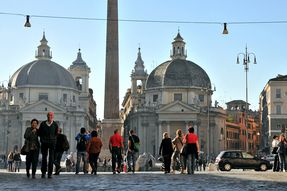 Piazza del Popolo with Egyptian obelisk and the two churches Santa Maria dei Miracoli and Santa Maria di Montesanto, Rome, Italy