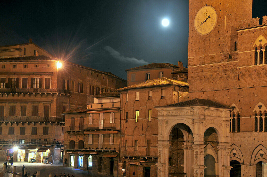 Full moon over Piazza del Campo with town hall, Siena, Tuscany, Italy
