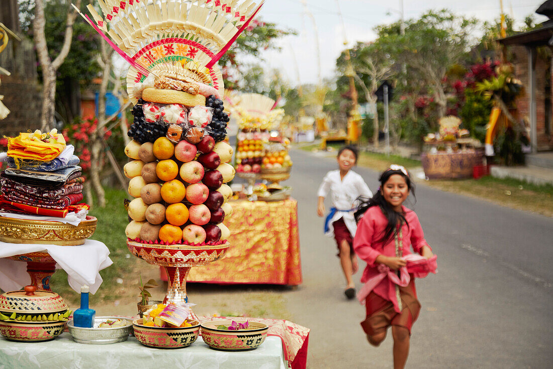 Decorated offering tables along a street, Tugu Br. Tinungan, Bali, Indonesia