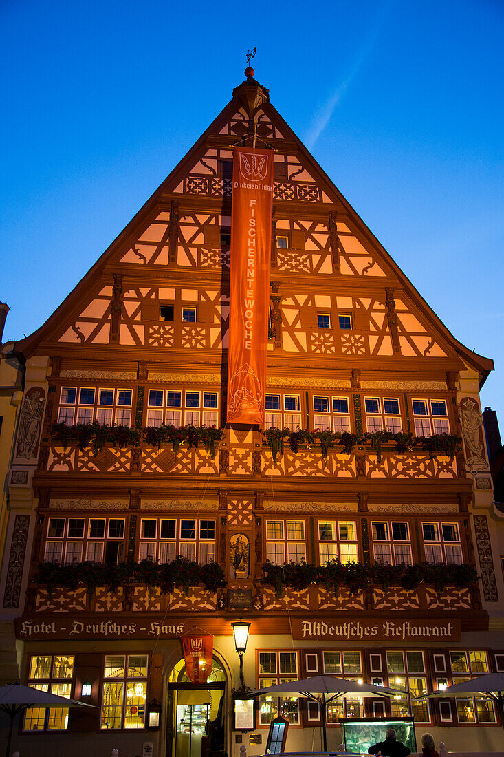 Gasthof Deutsches Haus, restaurant in the old town at dusk, Dinkelsbuehl, Franconia, Bavaria, Germany