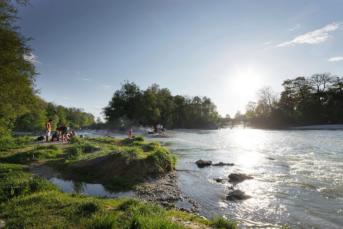 People barbecueing at river Isar, Flaucher, Munich, Bavaria, Germany