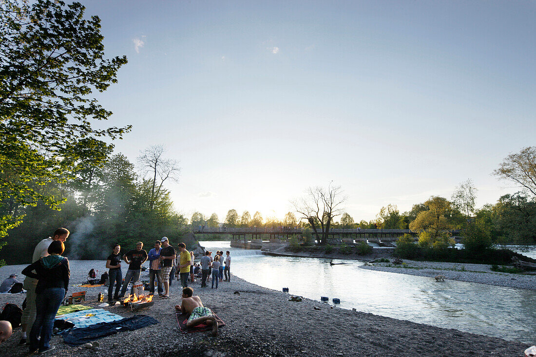 People barbecueing at river Isar, Flaucher, Munich, Bavaria, Germany