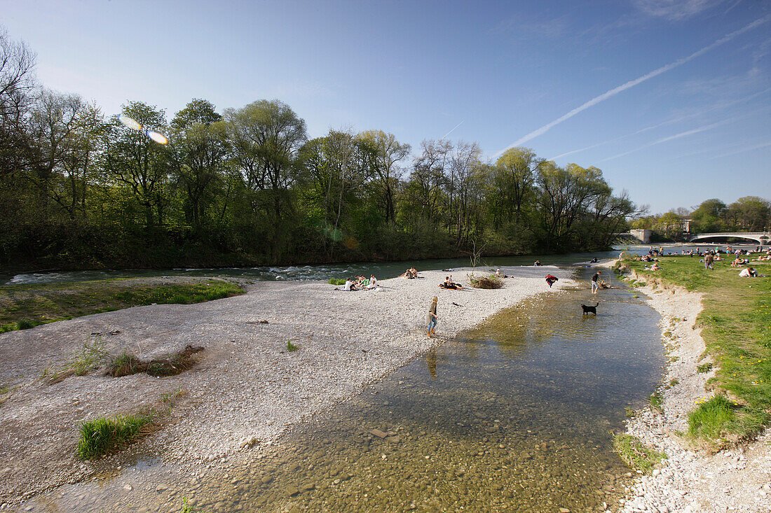 People relaxing at river Isar, Mullersches Volksbad, Munich, Bavaria, Germany