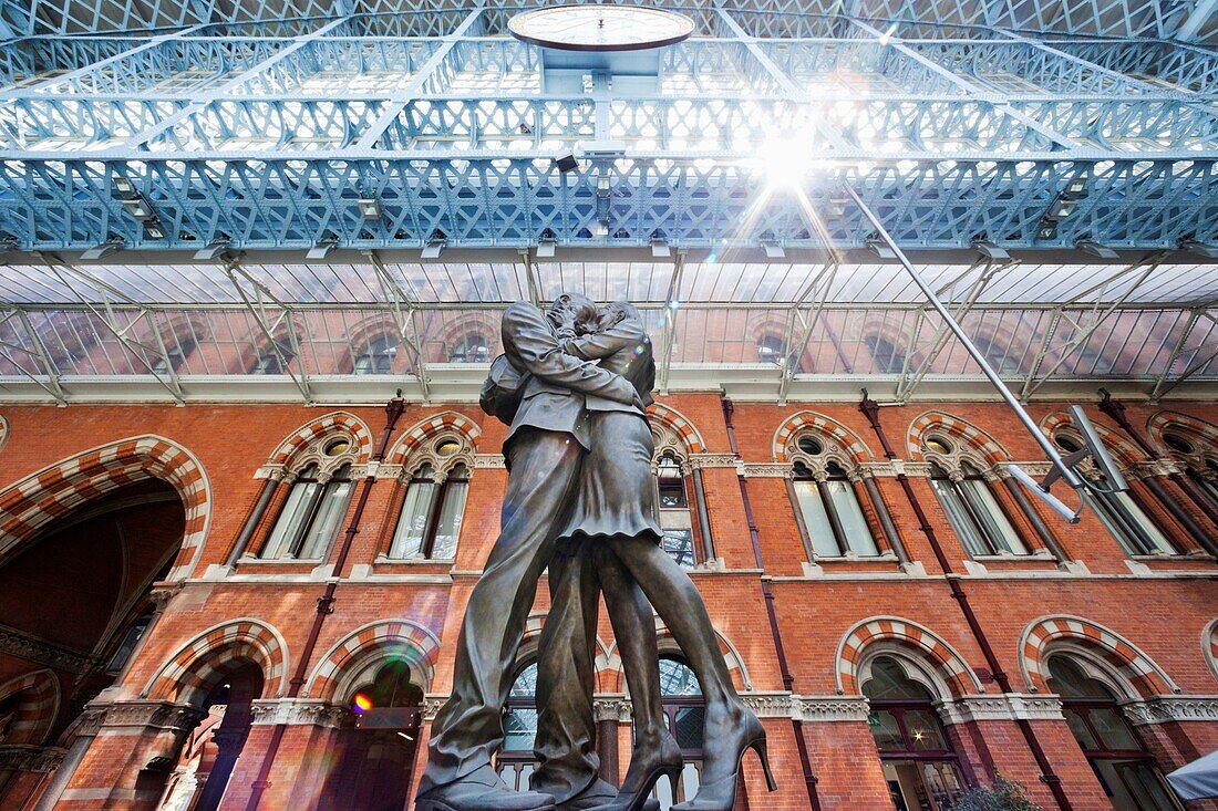 'UK, England, London, Kings Cross, St Pancras Station, ''The Meeting Place'' Sculpture by Paul Day'